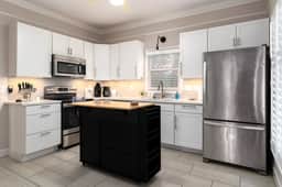 Executive 3-Bed Townhouse w/ 2-Car Garage - Image 3